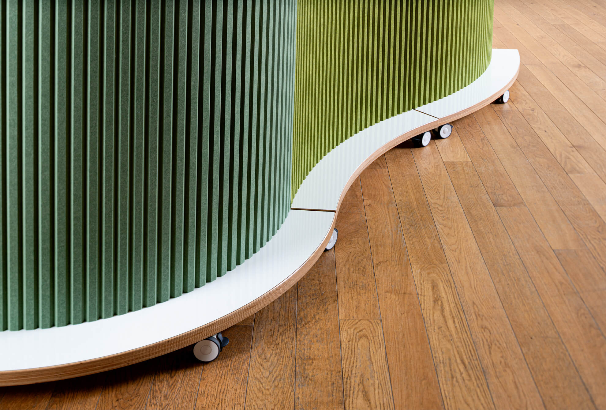 close up of 45 and 90 degree freestanding acoustic curved divider