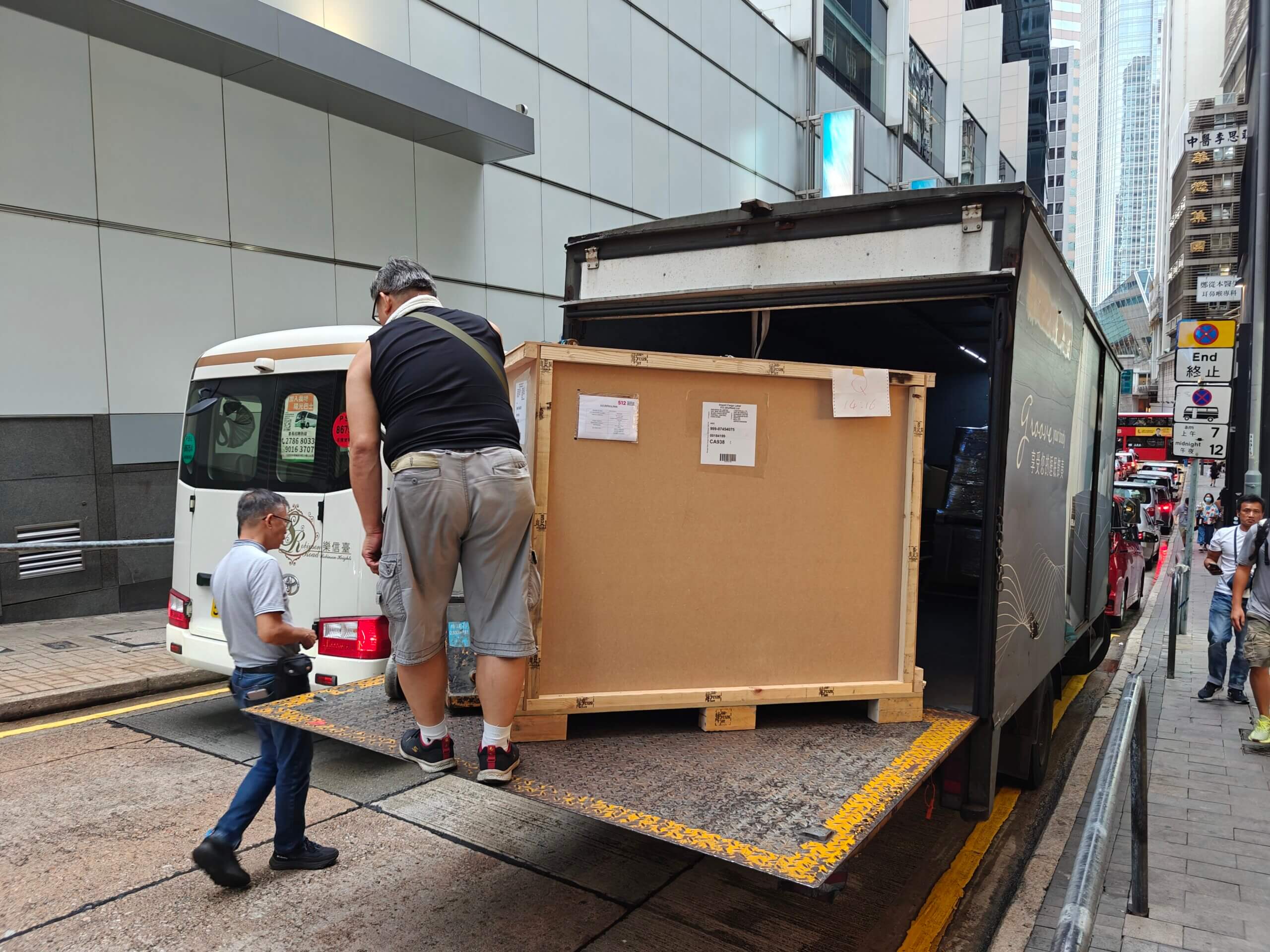 Unloading in a Hong Kong street of a ThinkingWall Cupboard Combi mobile wooden office cabinet