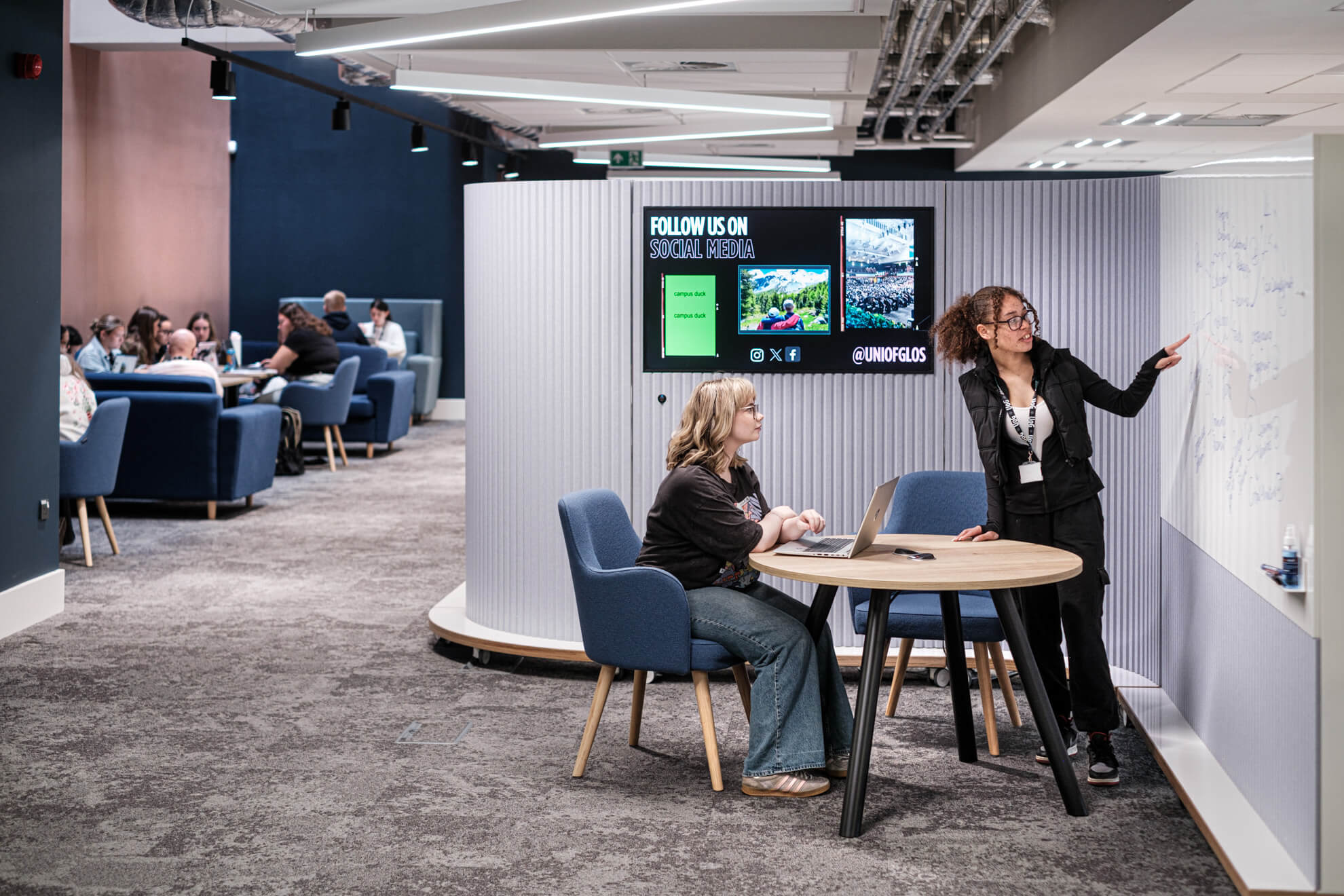 two women meet in a collaboration space